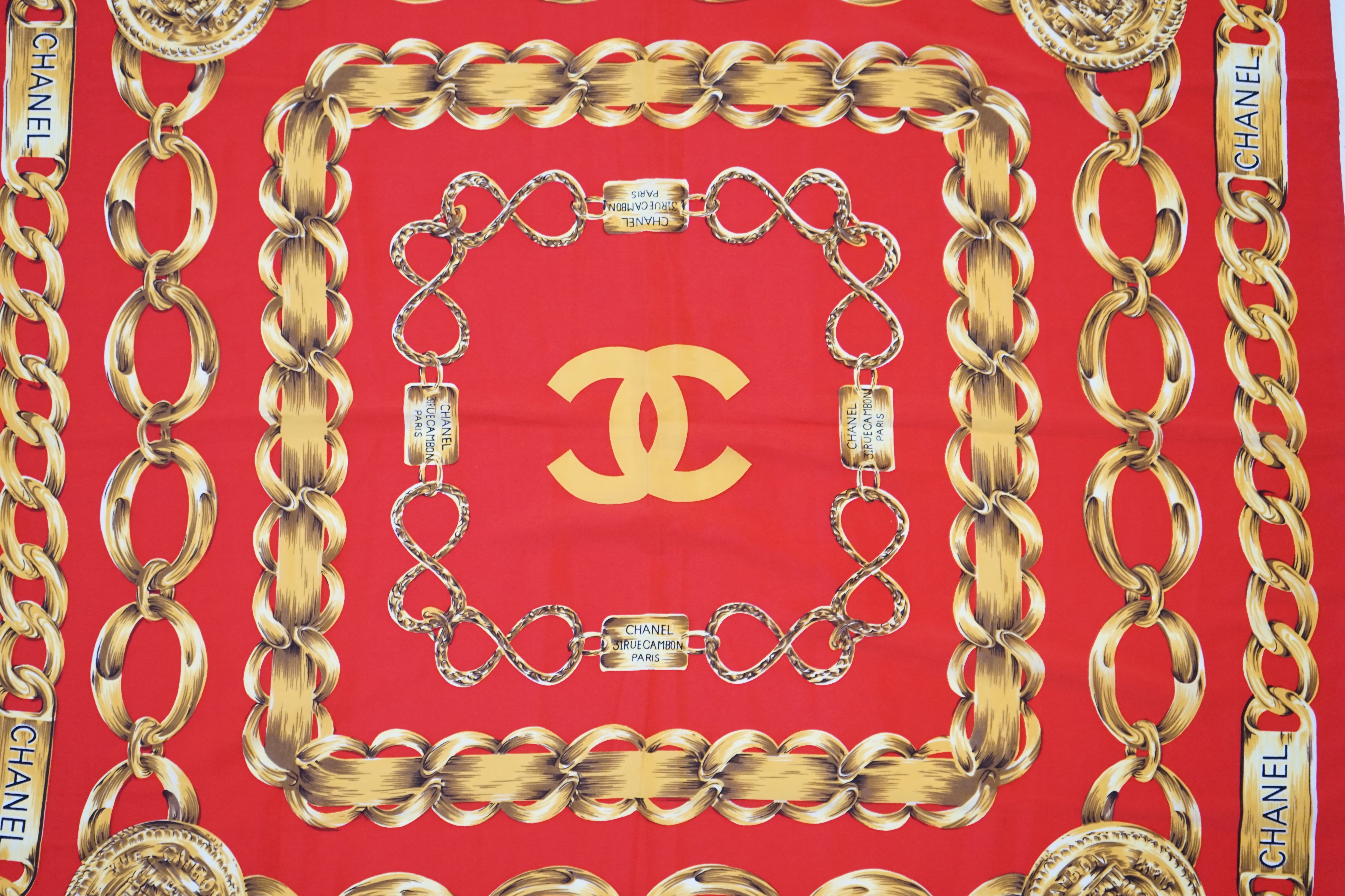 A Chanel Red Chain large silk scarf, 80cm x 80cm